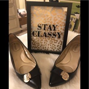 Bandolino black leather heels with silver buckle